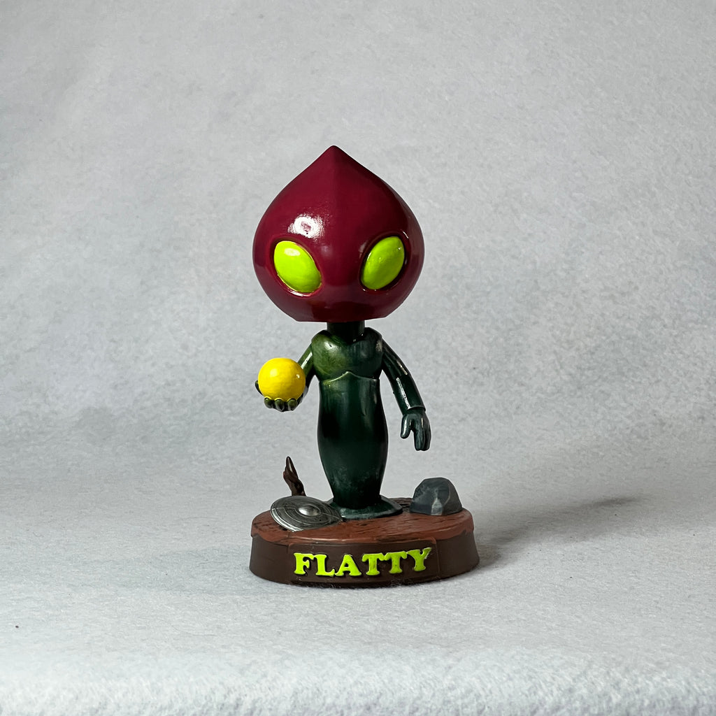 Flatty figurine from the Pokémon series on a white background